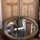 Oval gold mirror