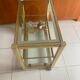 Desserte Hollywood Regency en verre et laiton