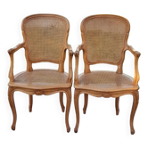 Pair of Louis XV style caned armchairs