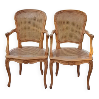 Pair of Louis XV style caned armchairs