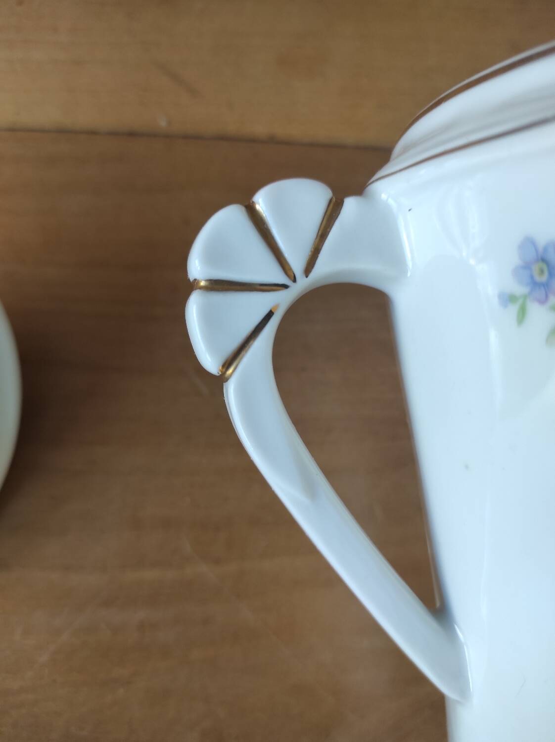 Porcelain sugar bowl with floral decoration
