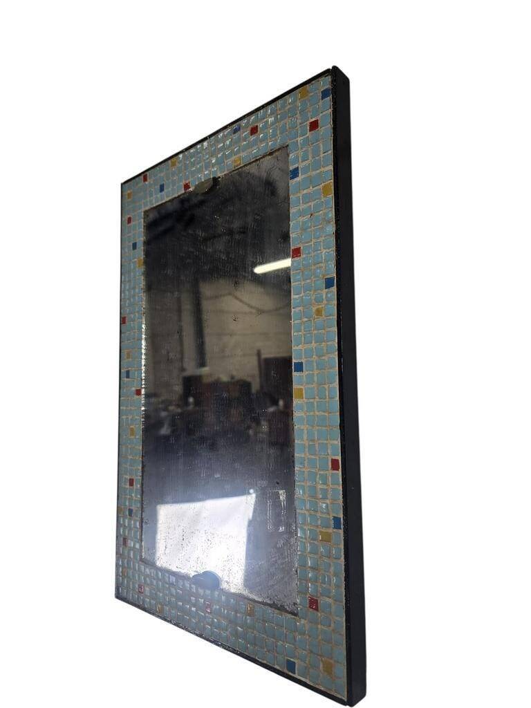 Vintage wall mirror in mint blue mosaic