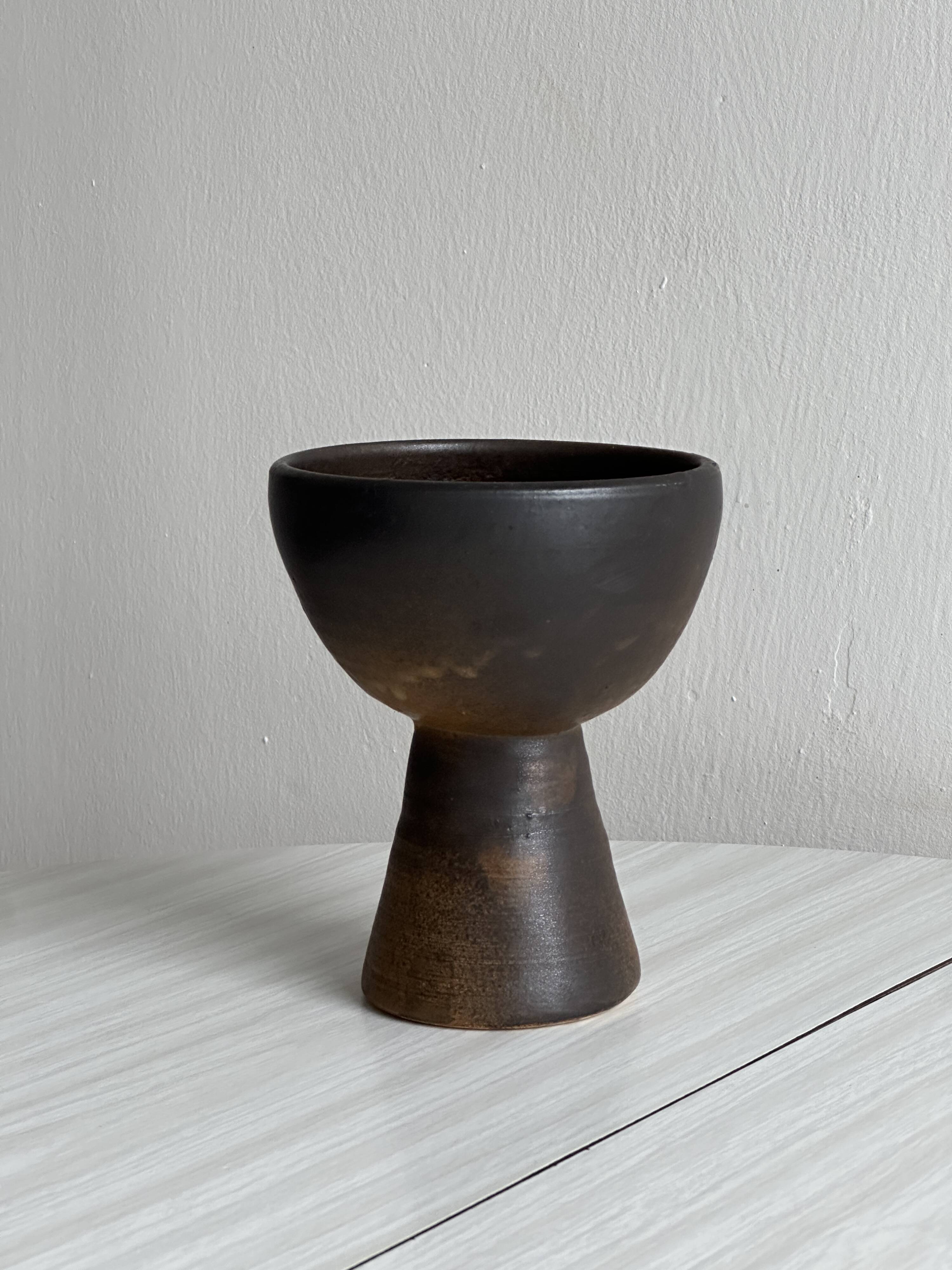 Dark brown raw ceramic cup