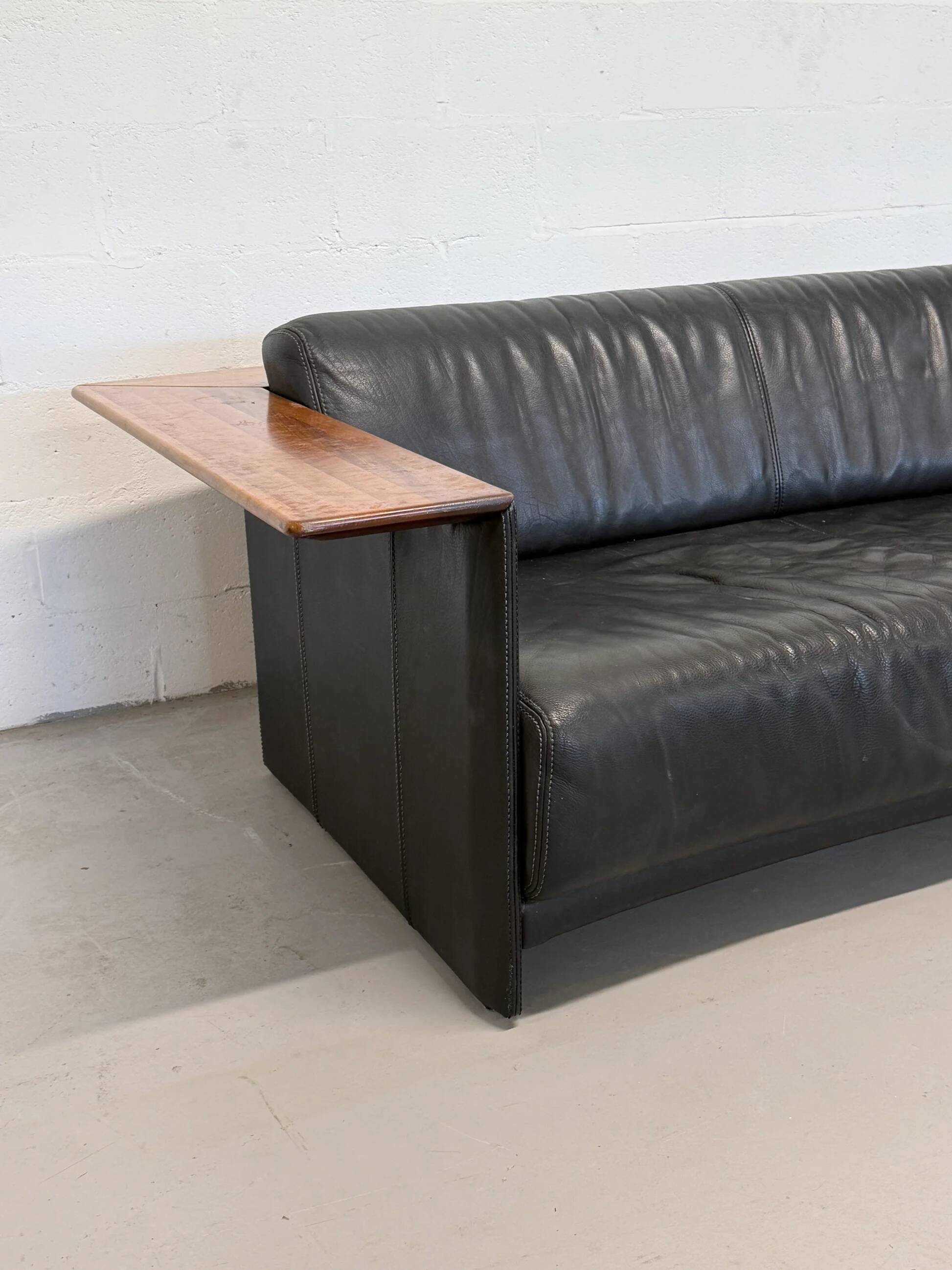Vintage Black Leather Loveseat with Cantilevered Walnut Tray Arms
