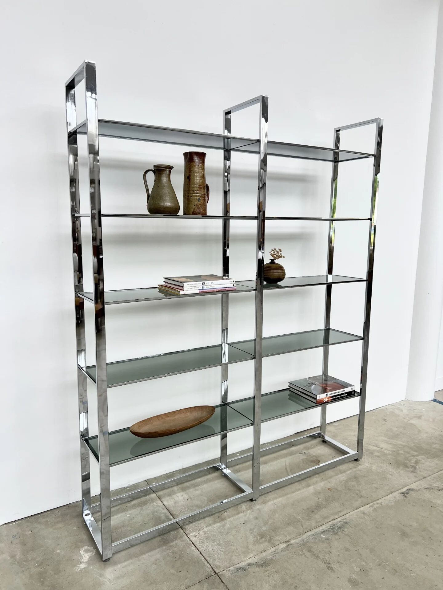 Chrome bookshelf with smoked glass — Italy, 1970s