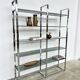 Chrome bookshelf with smoked glass — Italy, 1970s