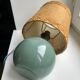 Table lamp with feet in water green opaline and woven lampshade 60s-70s