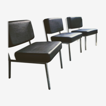 3 black armchairs