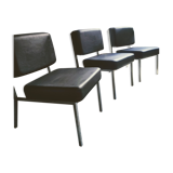 3 black armchairs