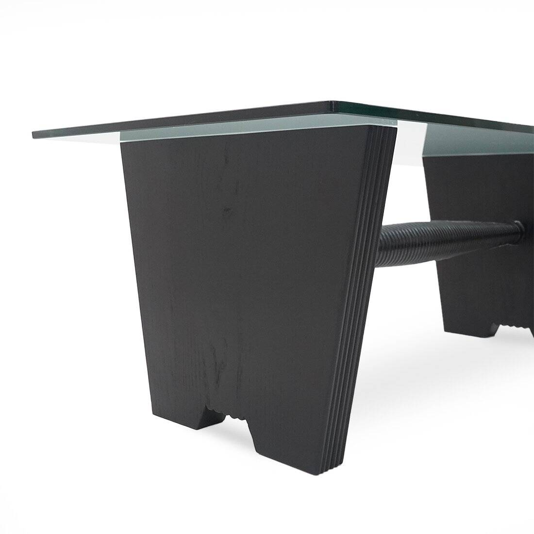 Coffee table with a glass top and black stained wood frame, 1930s.