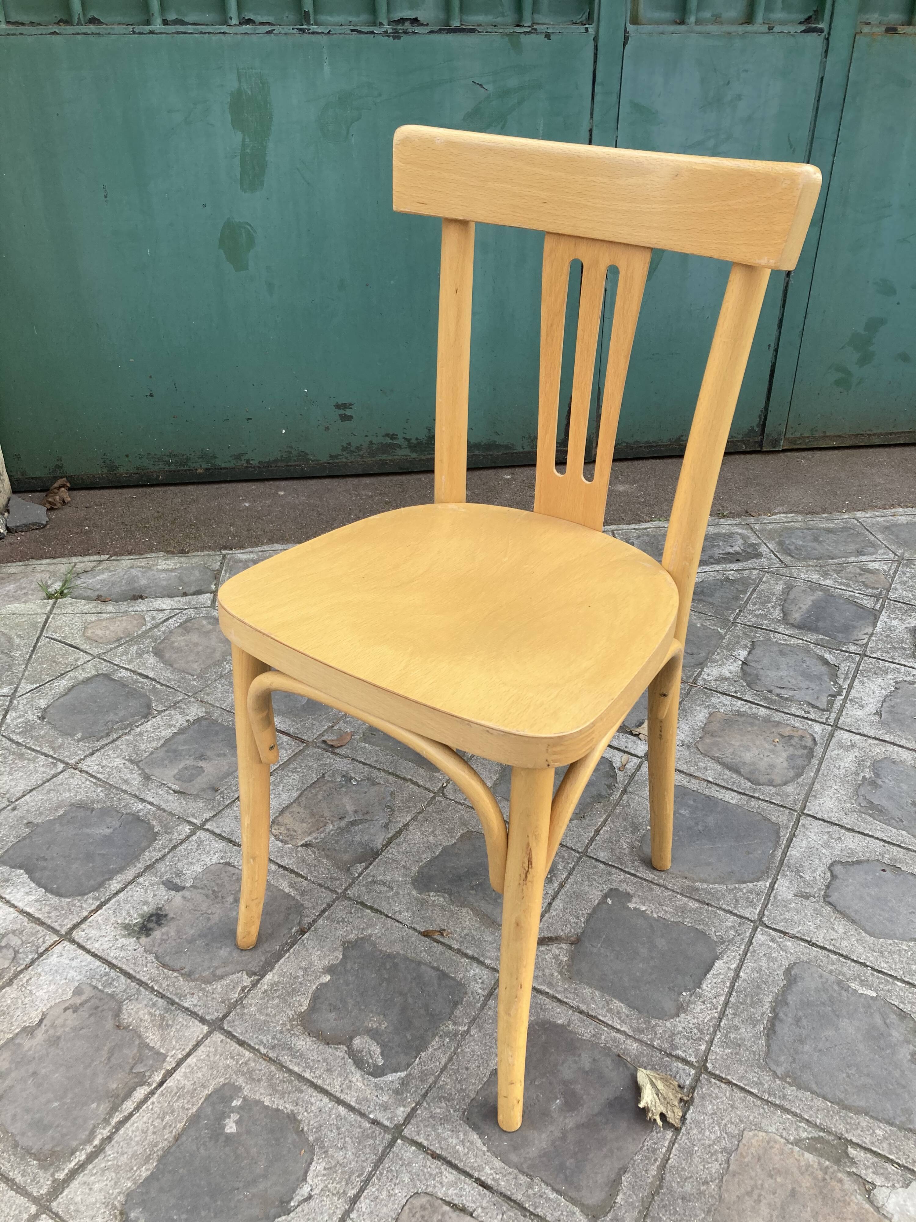 Set of 10 bistro chairs in light beech.