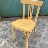 Set of 10 bistro chairs in light beech.