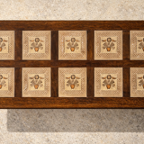 Vintage 60s coffee table with tile decoration of birds and flowers.