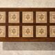Vintage 60s coffee table with tile decoration of birds and flowers.
