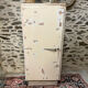 Small one-door Art Deco cabinet with a patina.