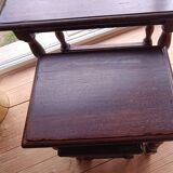 Nesting tables in oak wood. Turned wooden legs.