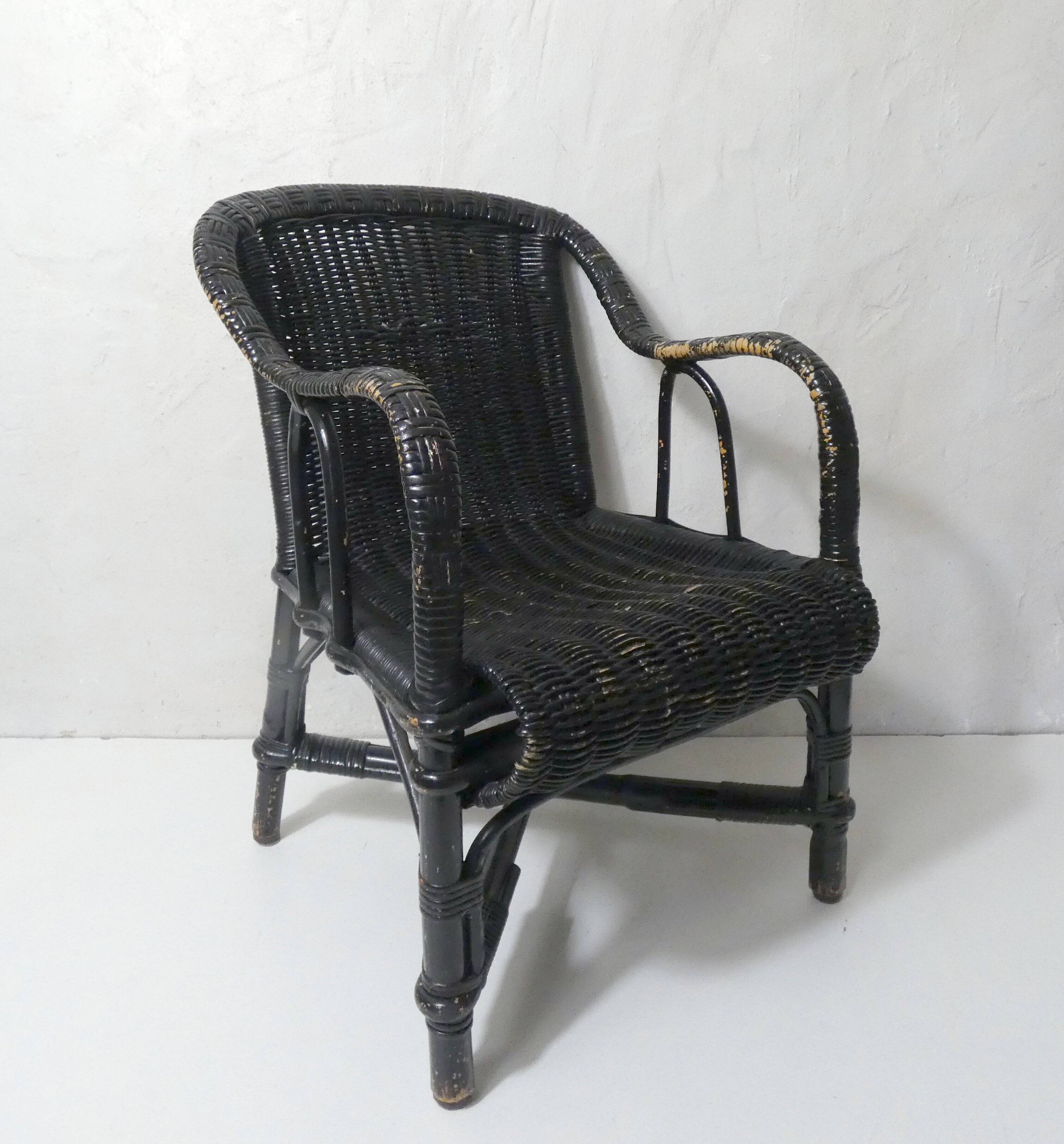 Vintage children's size rattan armchair