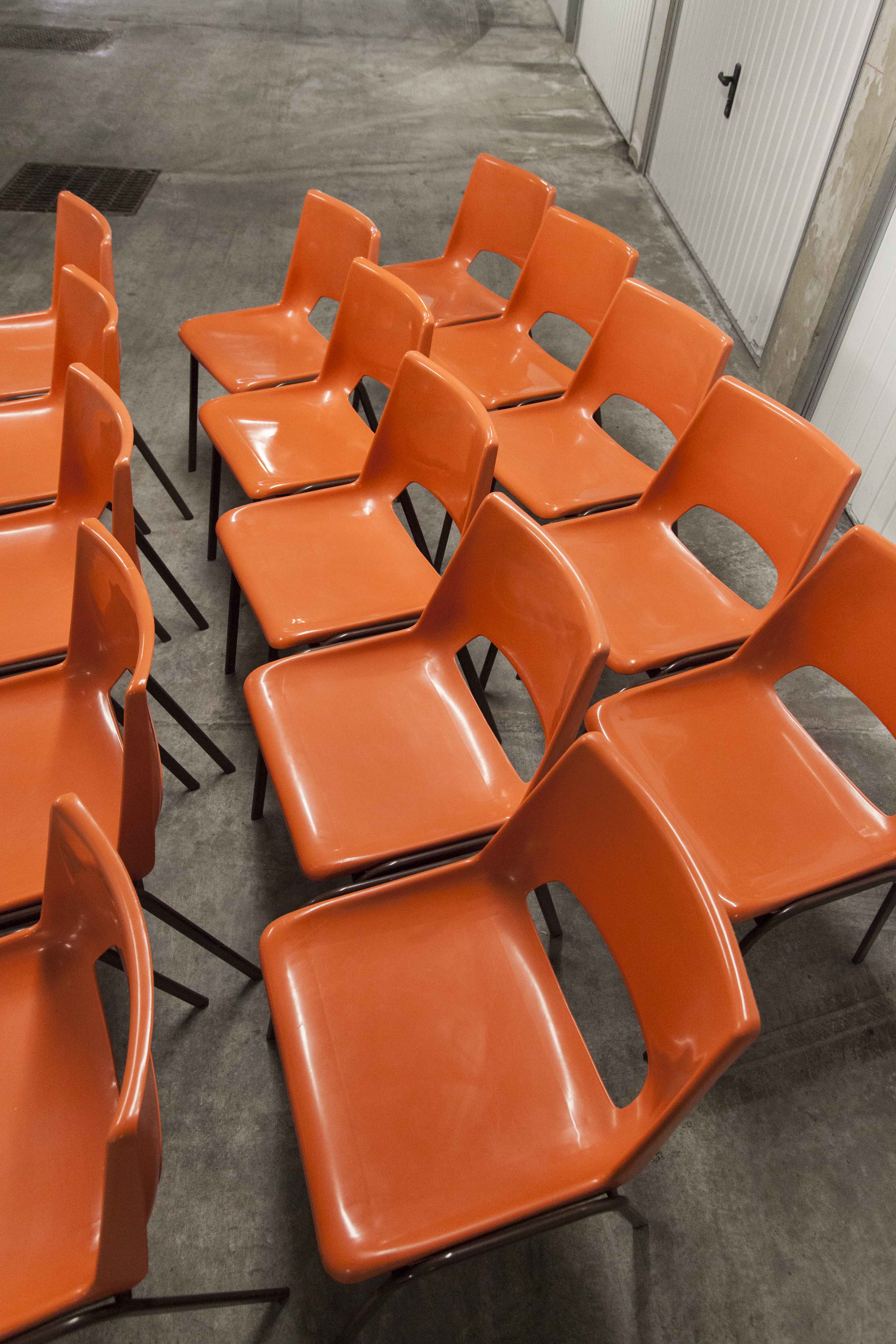 Set of 17 vintage orange chairs 1970