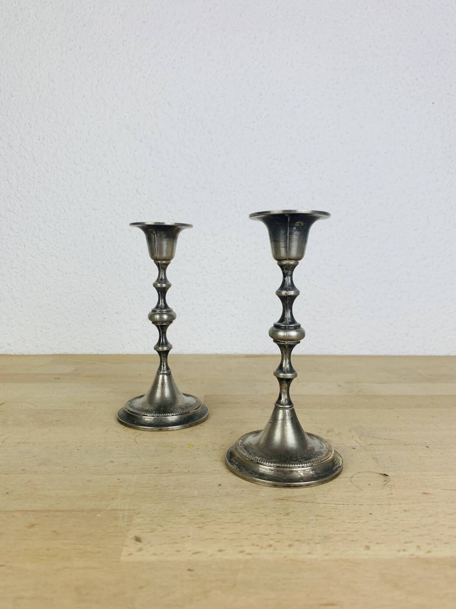 Pair of vintage silver-plated metal candlesticks