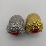 Salt and pepper shaker in silver and gold metal. Mirella. Circa 1960/70.
