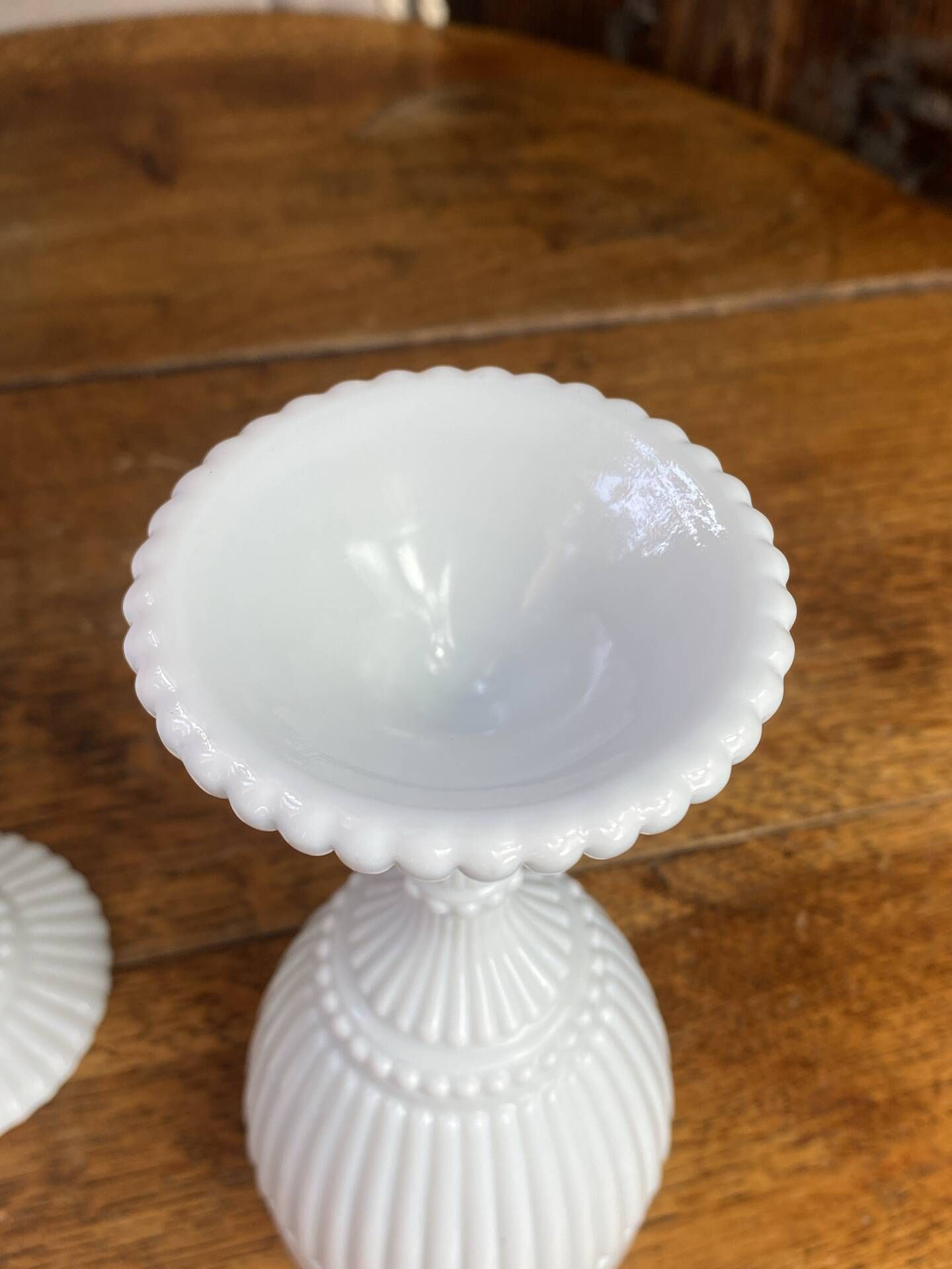 Footed glasses, white opaline chalices