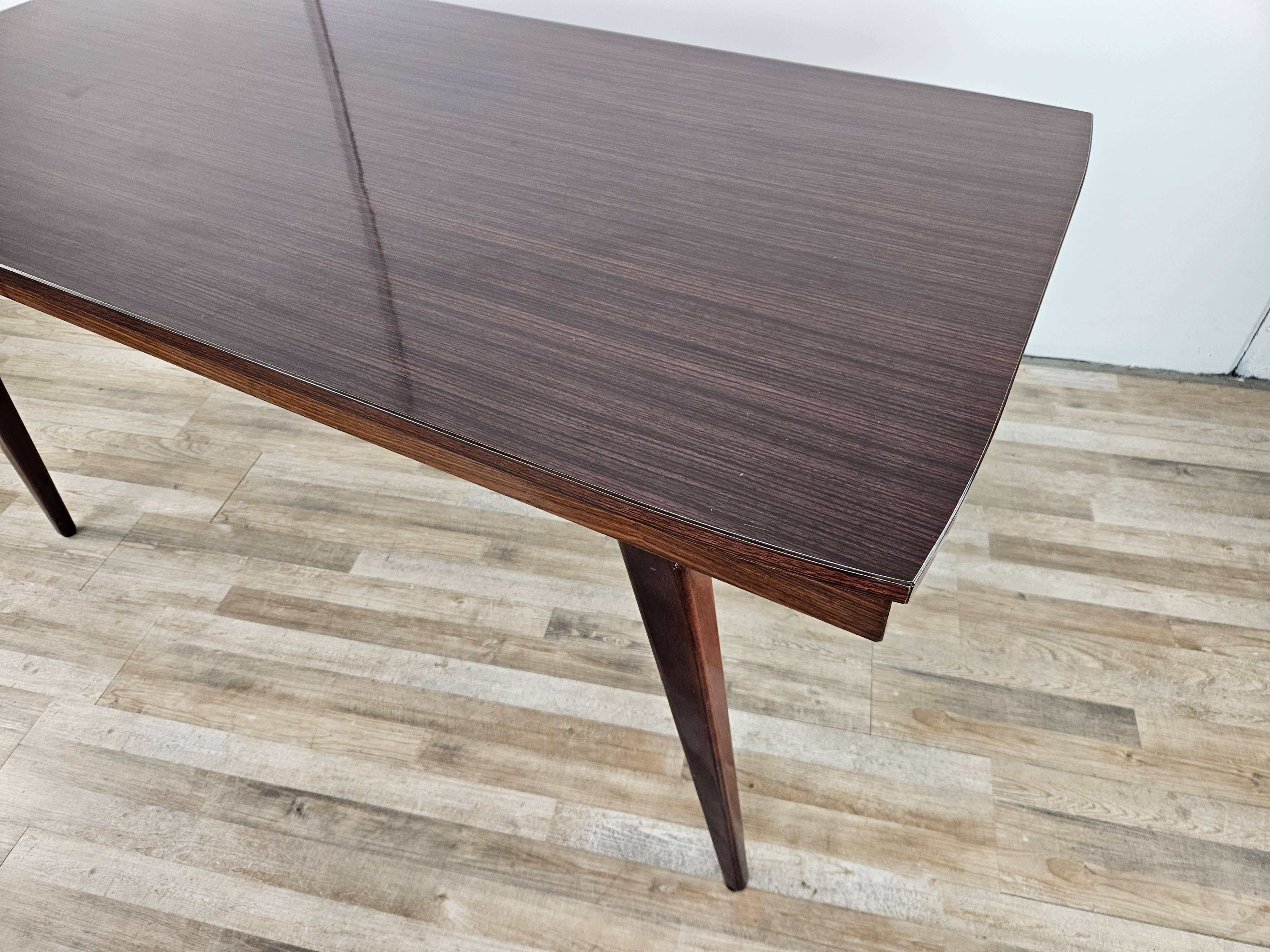 Mid Century table in rosewood laminate