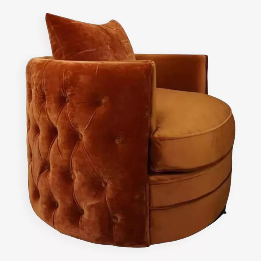 Fauteuil pivotant et capitonné en velours
