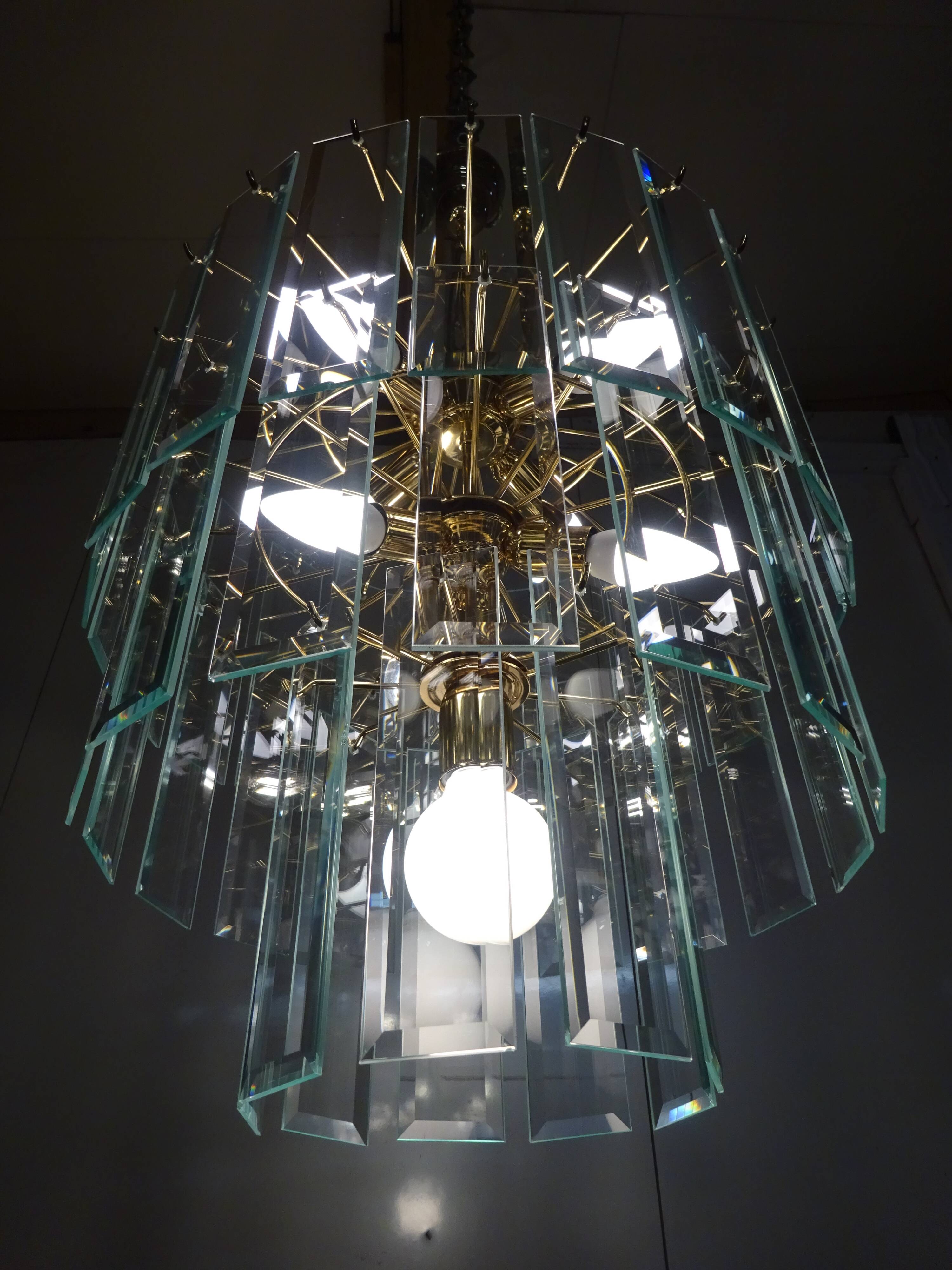 Brass chandelier and beveled glass, Italian manufacturing