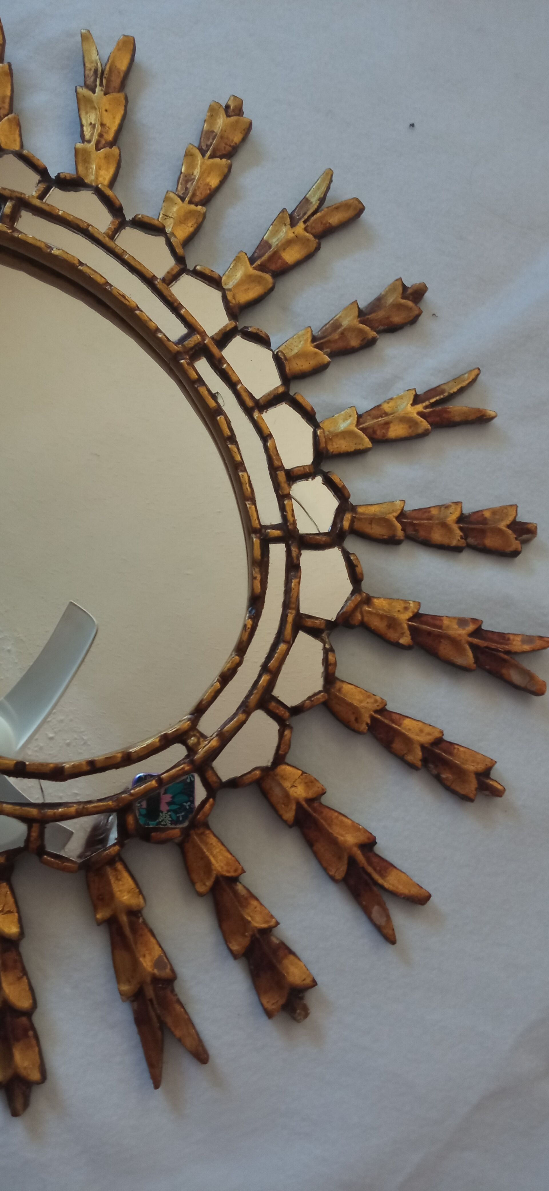 Sun mirror in gilded wood, 60x52 cm