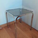 Square coffee table in chromed metal and smoked glass