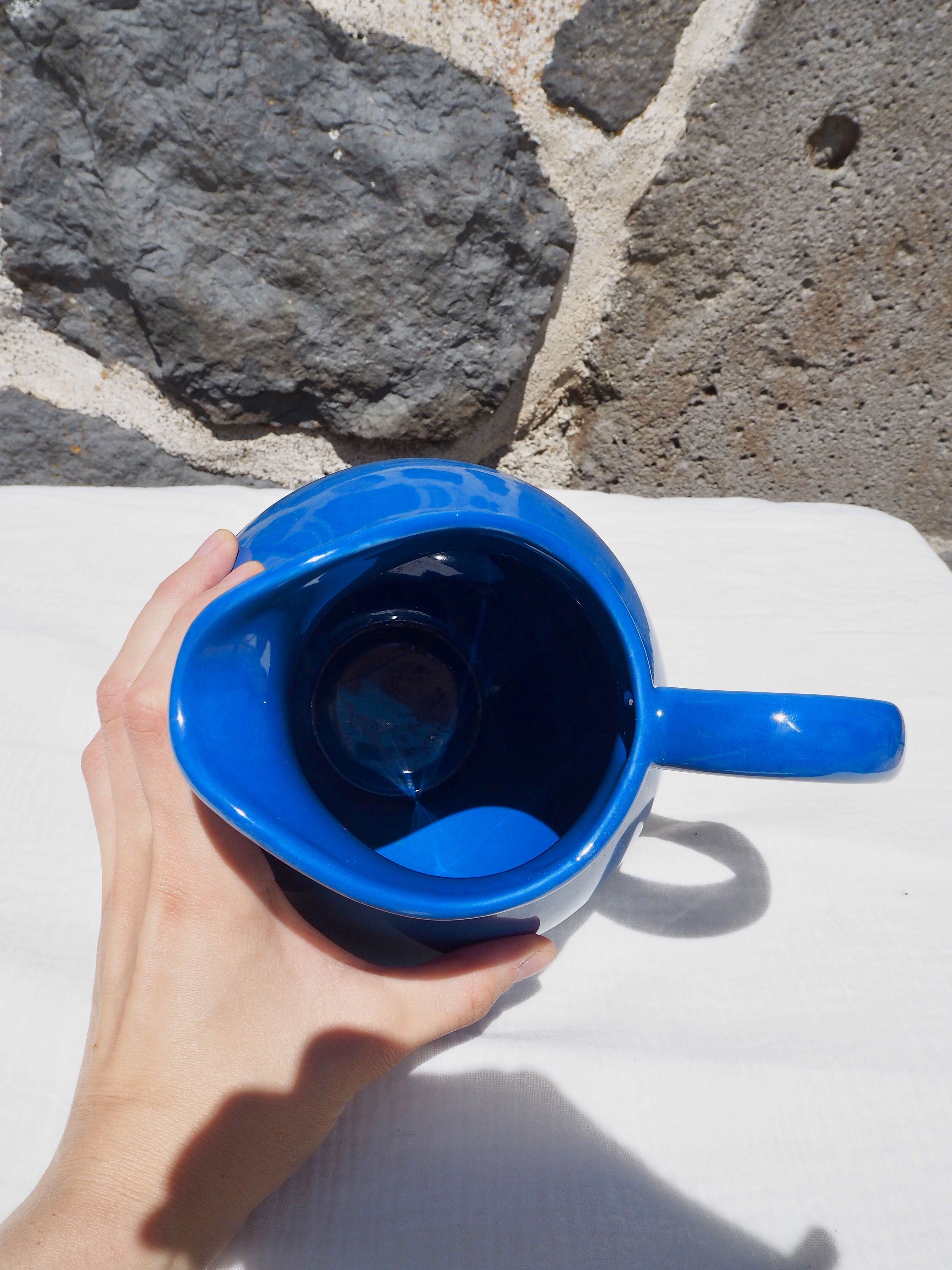 Blue ceramic belly pitcher