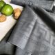 Suite de quatre serviettes de table teintées en gris smoke
