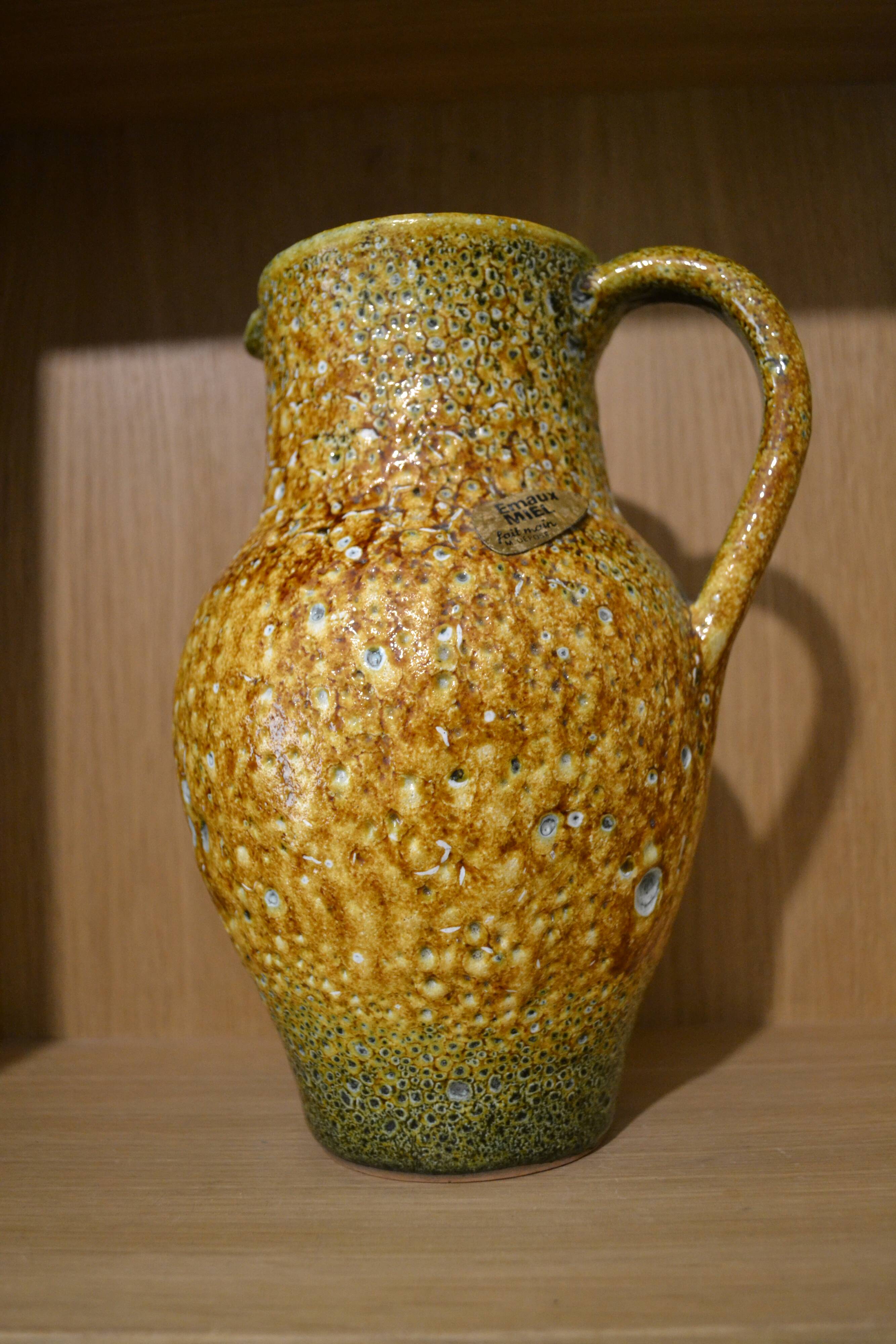 Handmade honey enamel pitcher