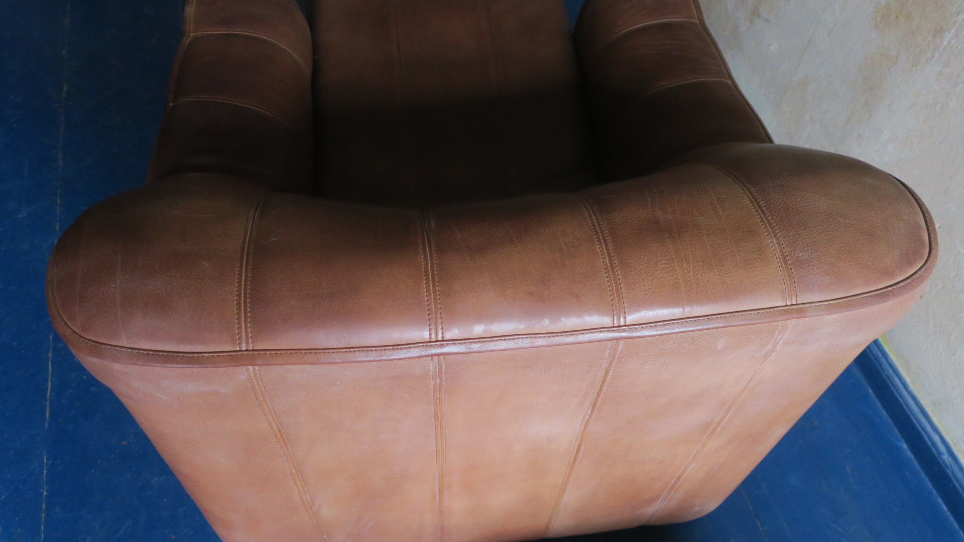 De Sede model DS44 patinated buffalo leather lounge chair and ottoman, 1970s