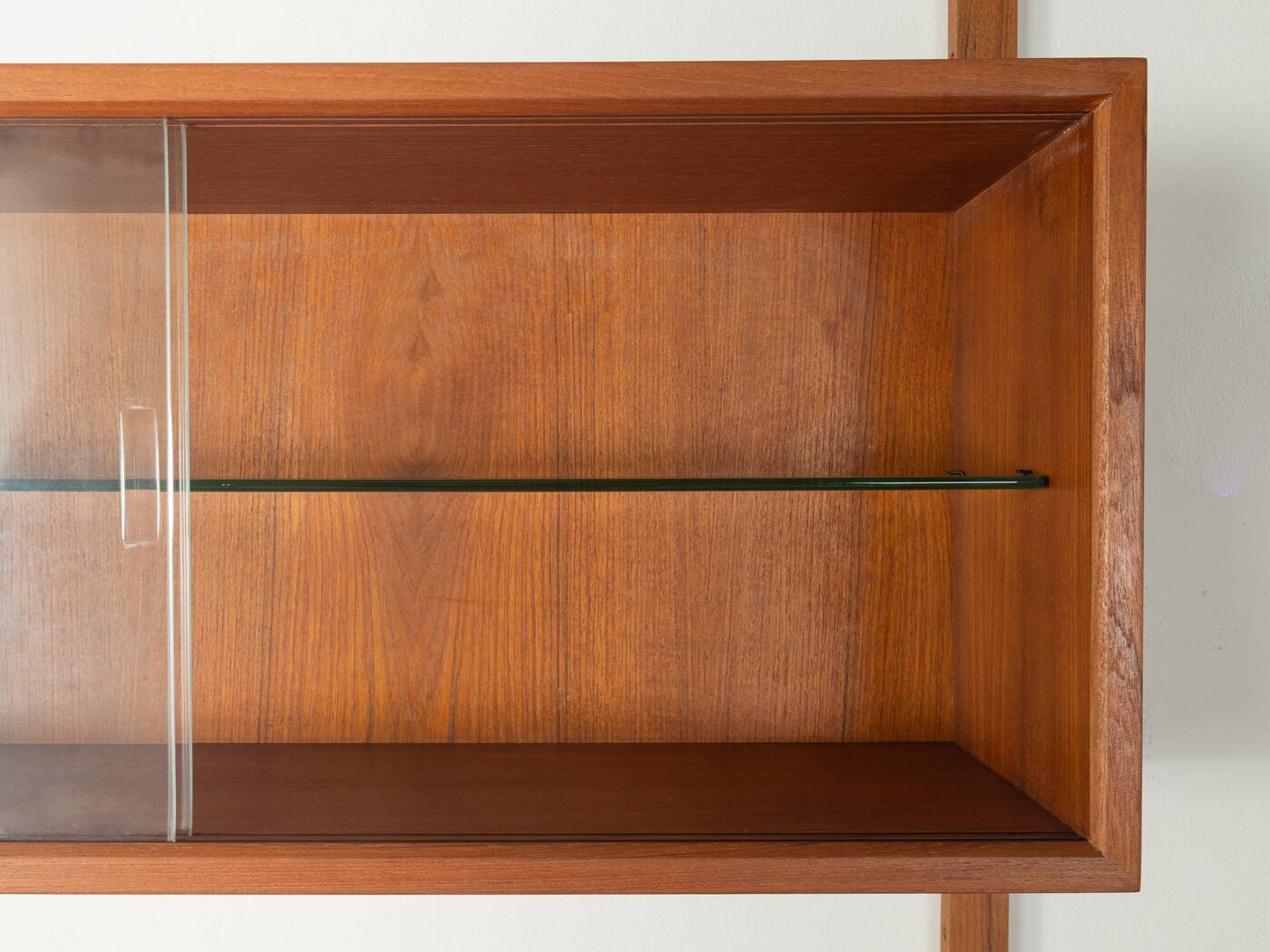 Classic shelving system from the 1950s in teak veneer by Poul Cadovius for Cado