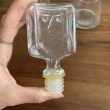 Pair of decanters by Erik Hoglund for Neiman Marcus, "People" series, Kosta Boda