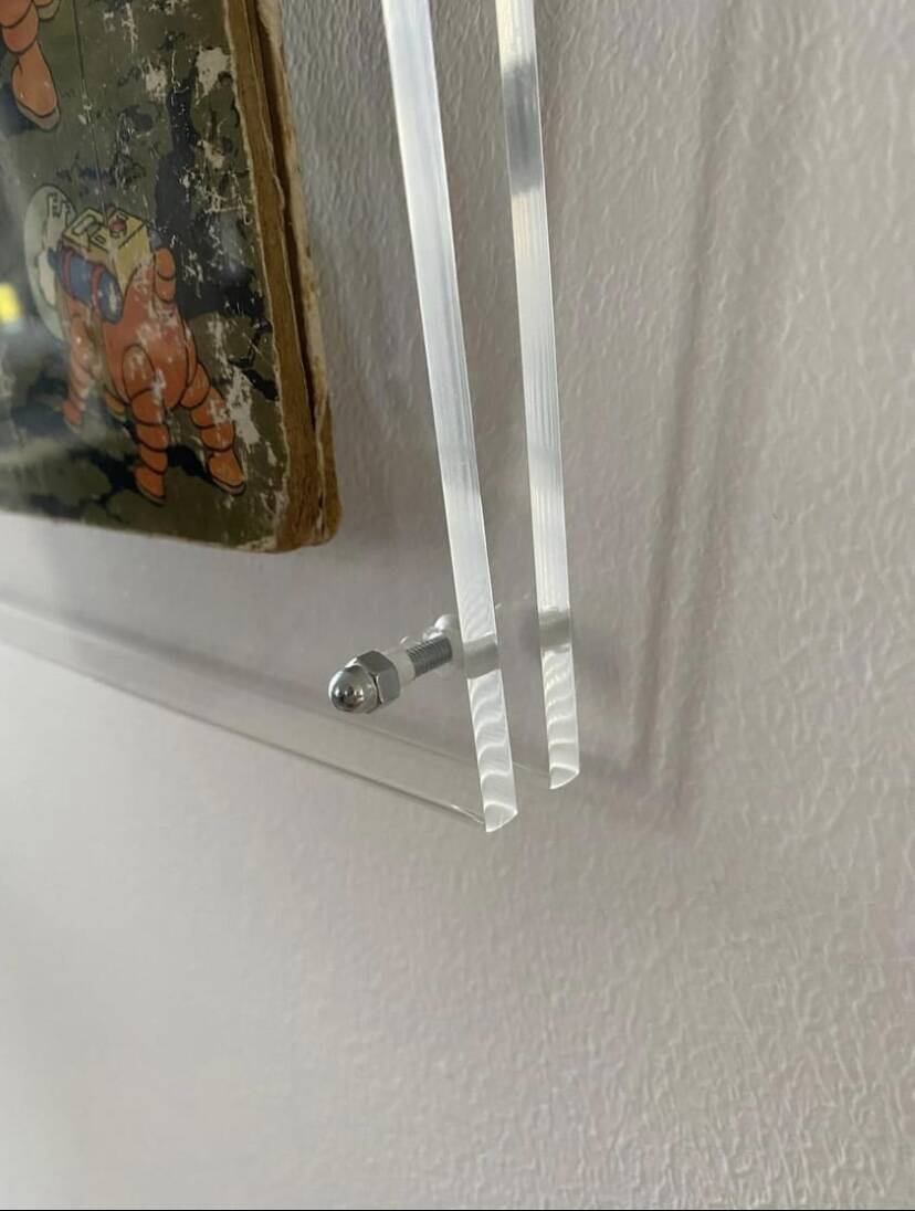 Plexiglas frame with original comic book