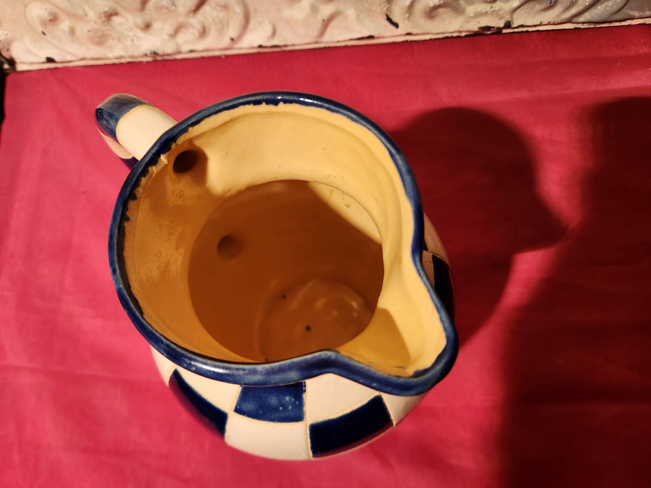 Ceramic jug with blue and white checkered pattern "Lustucru"