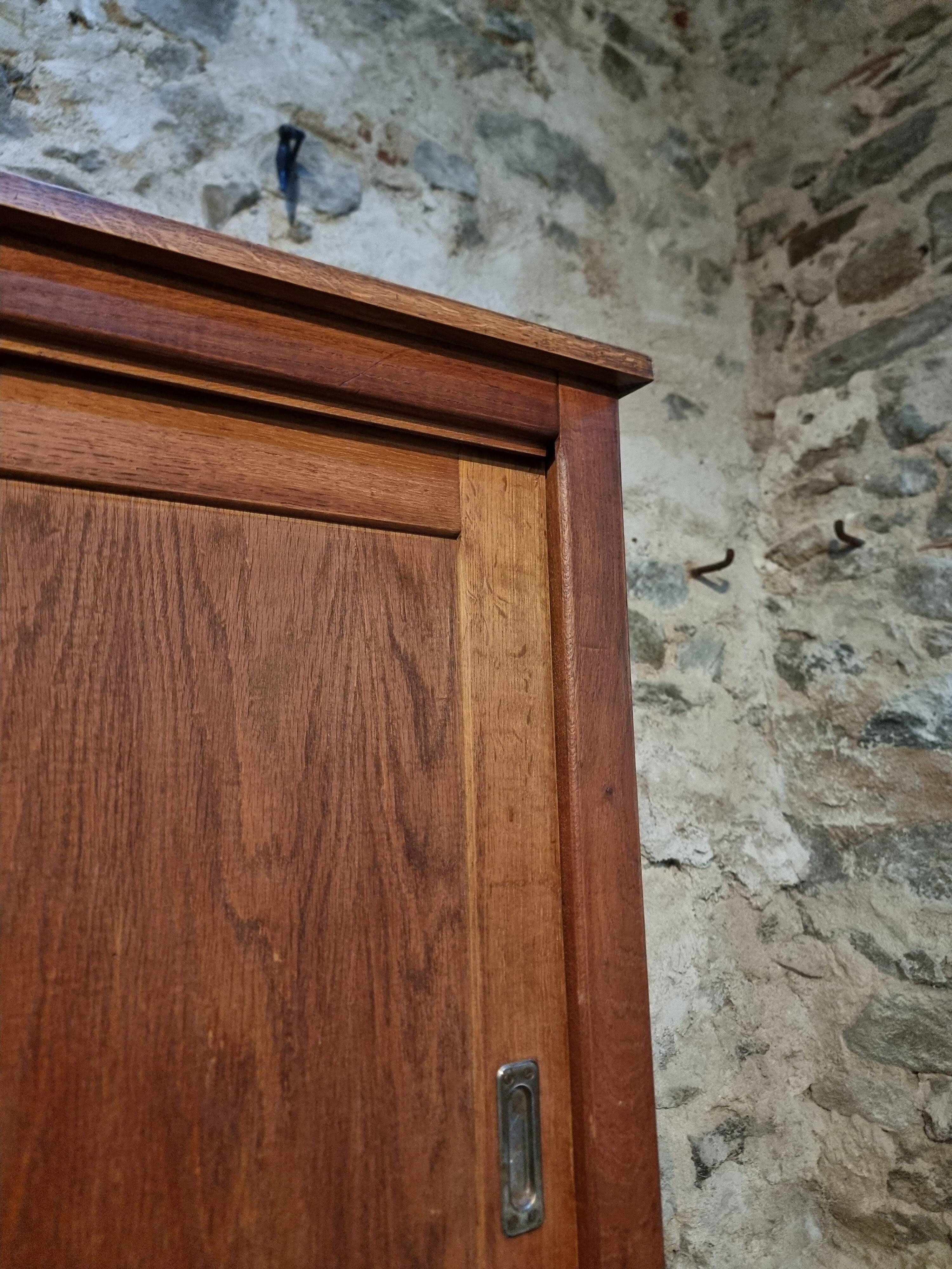 Oak sliding door wardrobe, 1920s