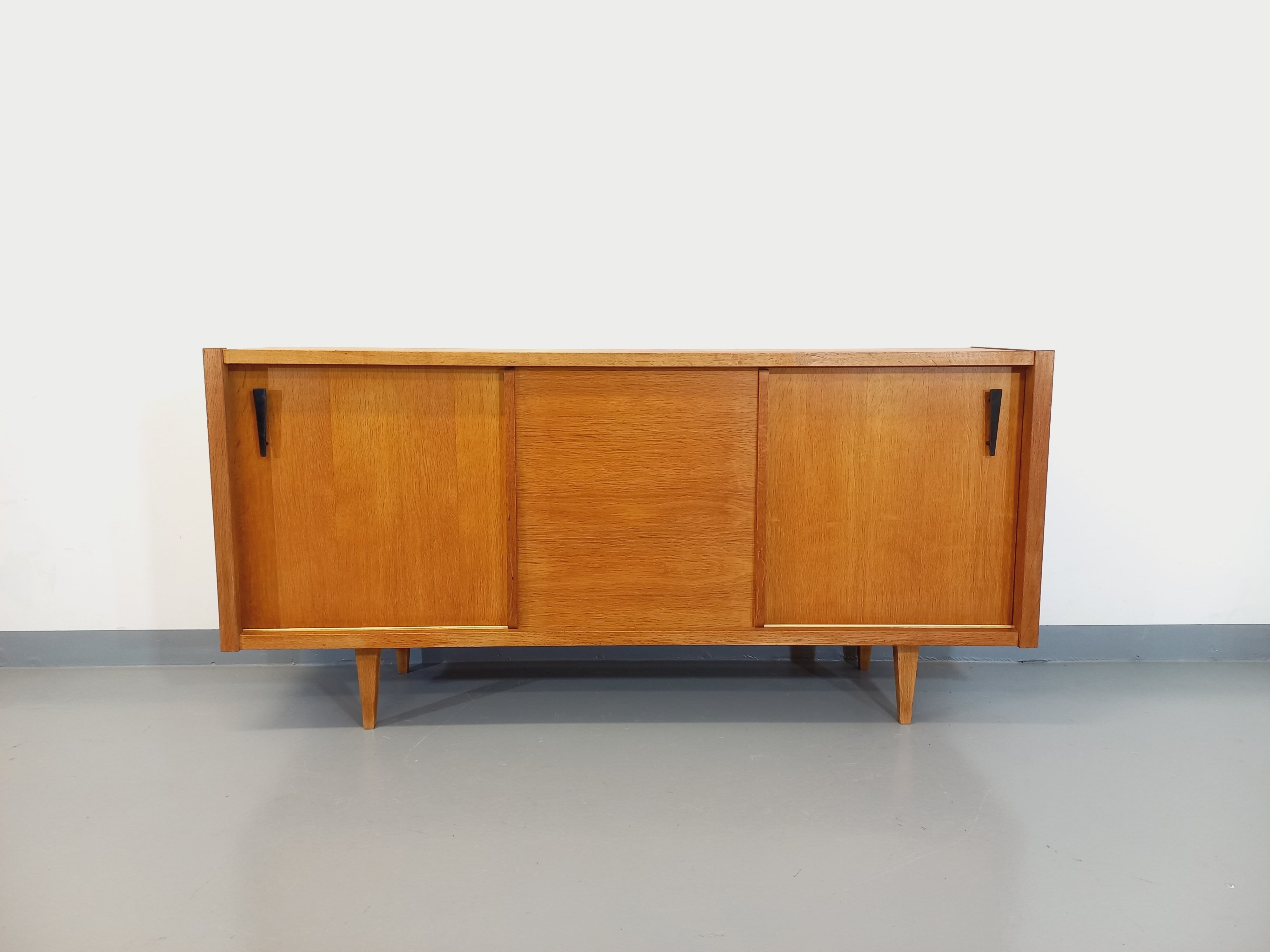 Vintage row in light oak wood from the 60s