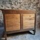French antique walnut commode with a dark grey marble top, circa 1830–1860.