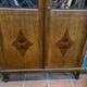 Mahogany showcase with marquetry