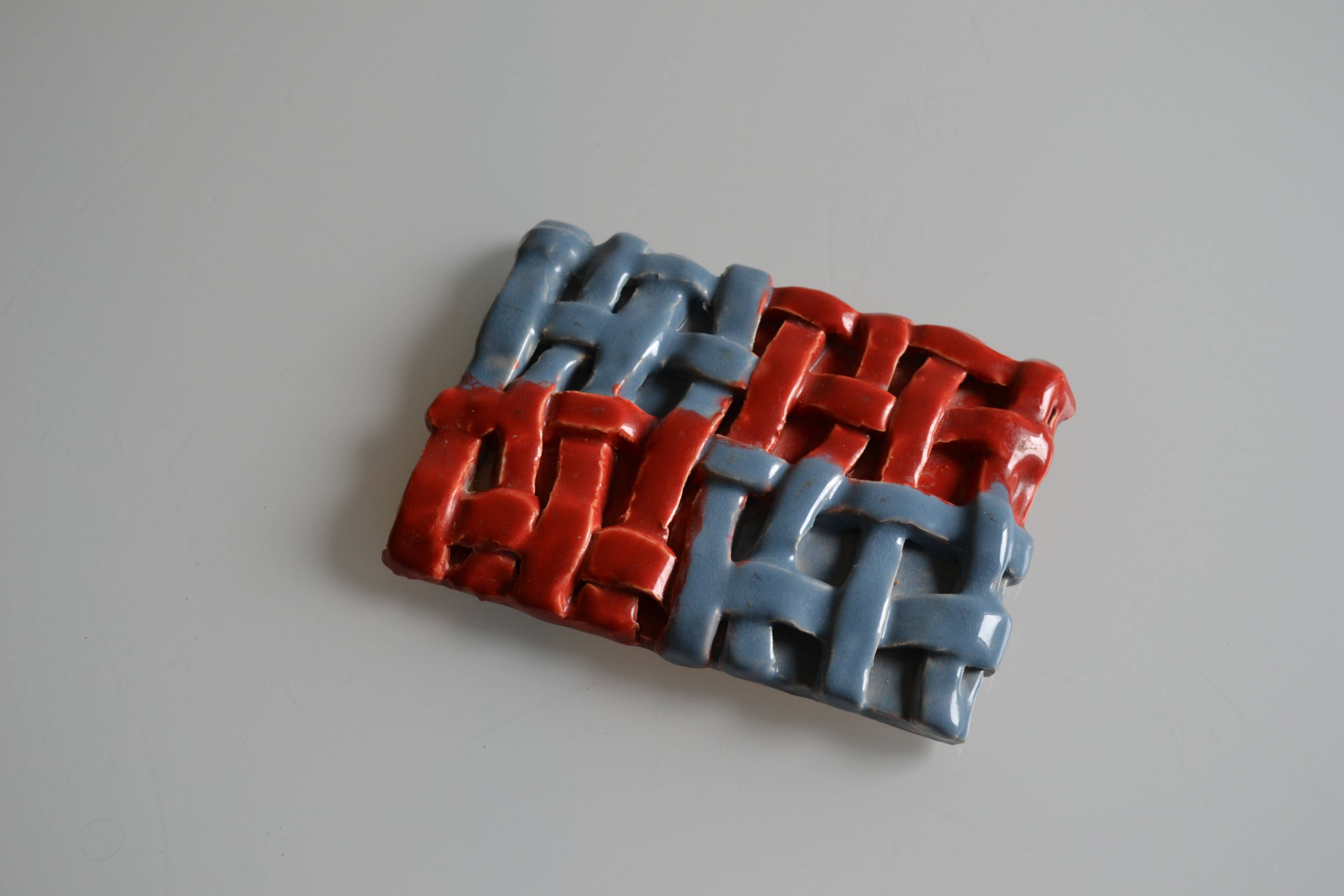 Vintage 1970 woven ceramic rest or trivet