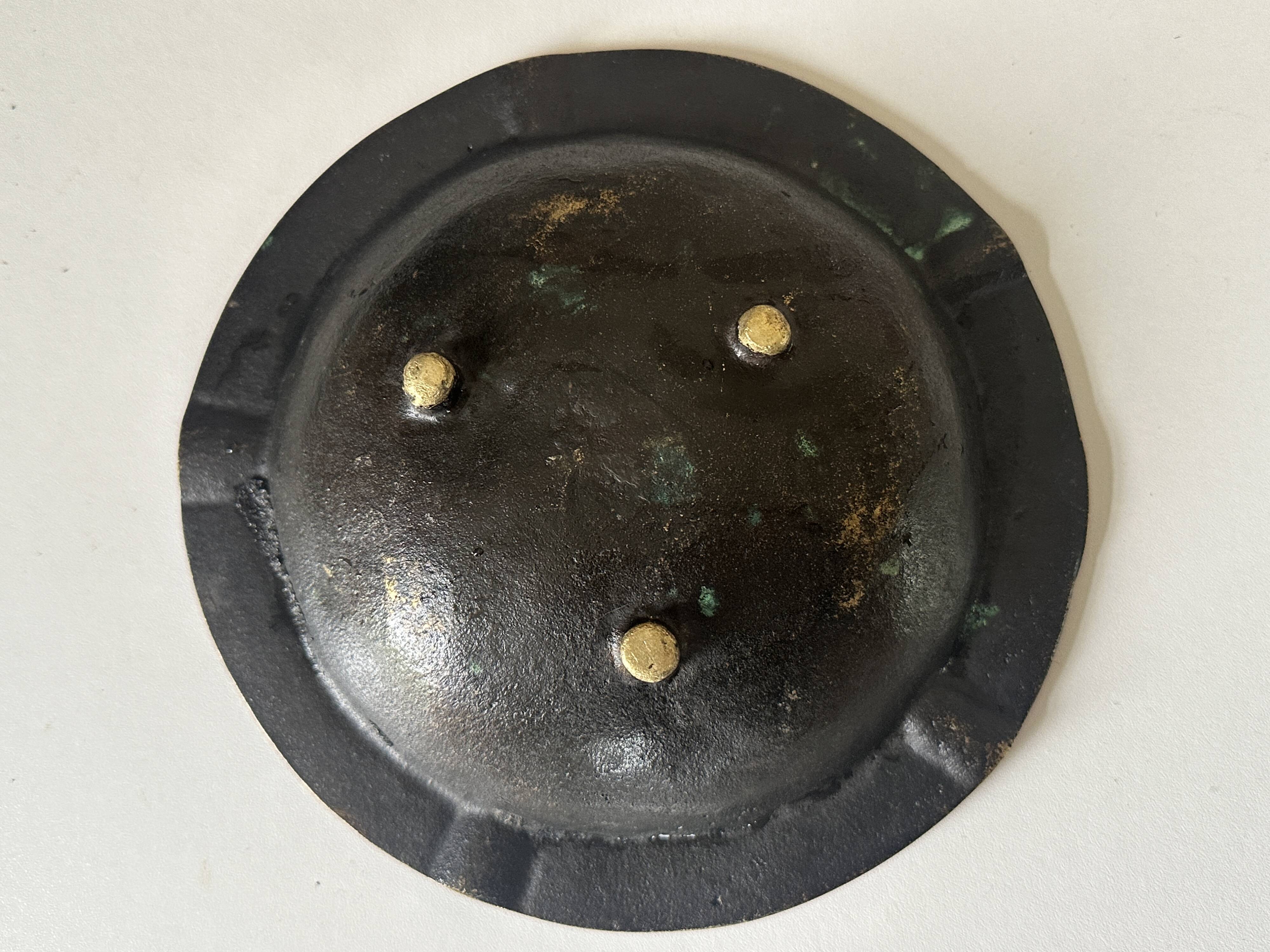 Vintage bronze ashtray design from the 60s