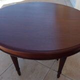 Extendable mahogany table with 6 tapered and fluted legs, Louis XVI style