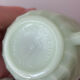 Ancienne tasse et sa soucoupe en opaline vert menthe