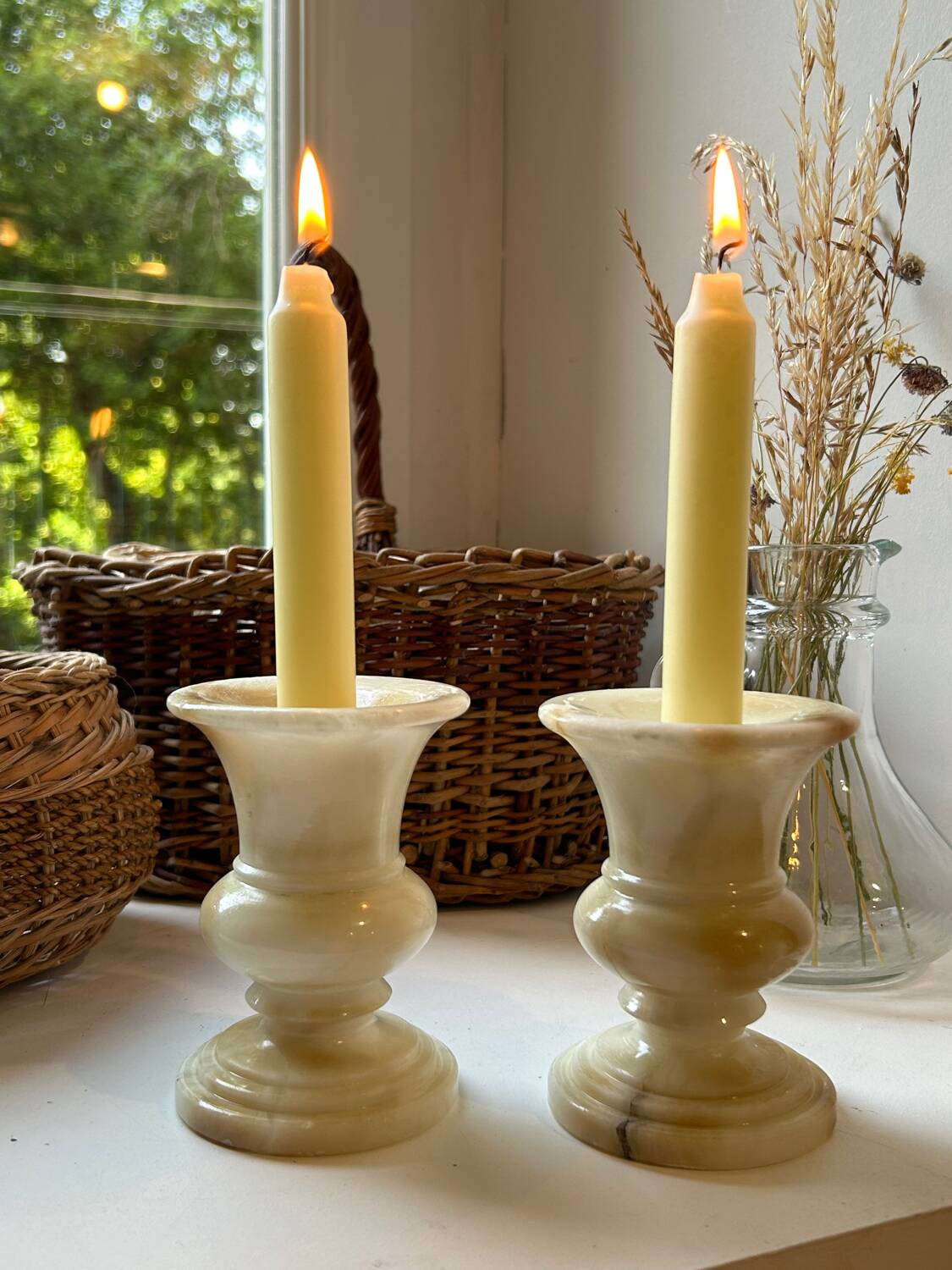 Pair of alabaster candlesticks