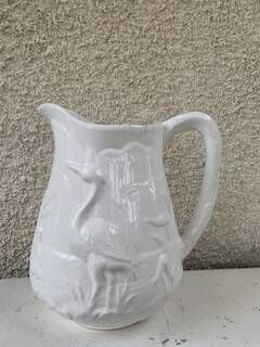 Carafe the heron in white glazed ceramic slipware.