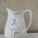 Carafe the heron in white glazed ceramic slipware.