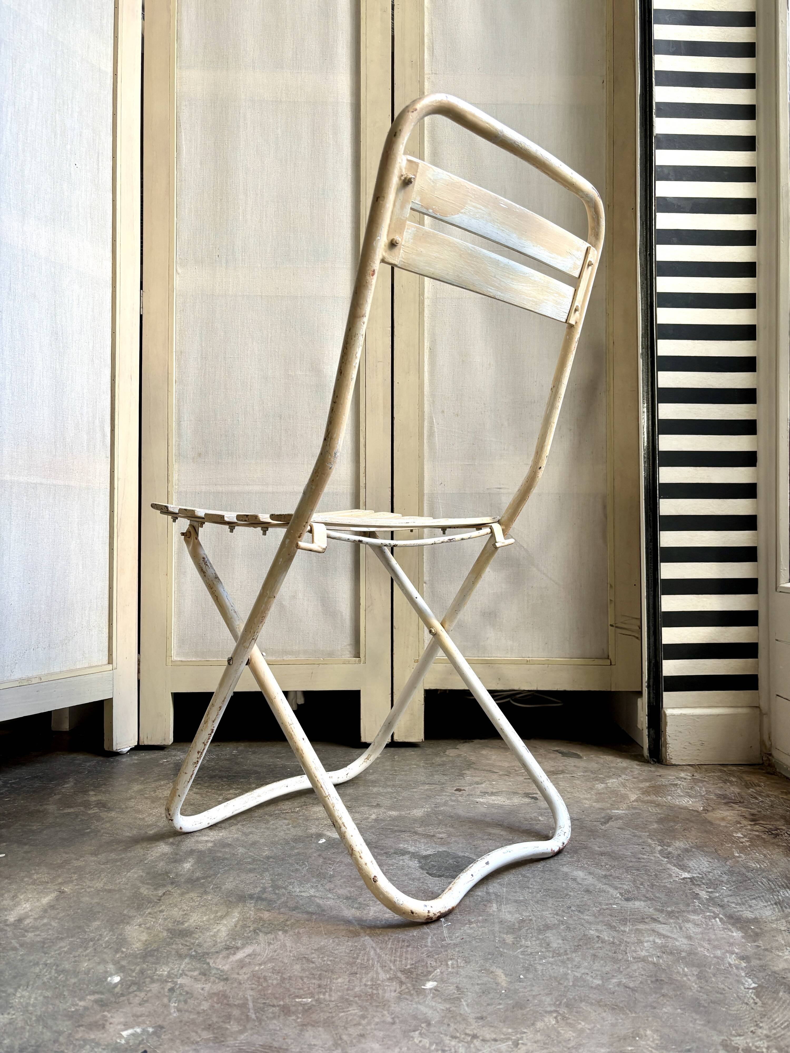 Beige wooden and metal folding chair